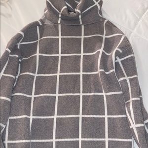 Grid pattern high neck sweater